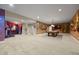 Large finished basement featuring carpet floors and pool table at 6420 Agave Ave, Castle Rock, CO 80108