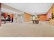 Bright basement features a pool table and bar, offering space for entertainment and relaxation at 6420 Agave Ave, Castle Rock, CO 80108