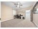 Bright bedroom showcasing work station, carpet floors, and natural light at 6420 Agave Ave, Castle Rock, CO 80108