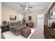 Cozy bedroom featuring a ceiling fan, neutral colors and a walk-in closet at 6420 Agave Ave, Castle Rock, CO 80108