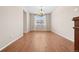 Elegant dining room featuring hardwood floors, a chandelier, and ample natural light at 6420 Agave Ave, Castle Rock, CO 80108