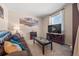 Cozy living room with a comfortable couch, natural light, and warm accents perfect for relaxing at 6420 Agave Ave, Castle Rock, CO 80108