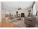 Spacious living room offers hardwood floors, modern furniture, and ample natural light at 6420 Agave Ave, Castle Rock, CO 80108