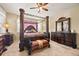 Primary bedroom featuring a four-poster bed, elegant furniture, and neutral tones for a serene and relaxing atmosphere at 6420 Agave Ave, Castle Rock, CO 80108