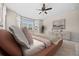 Bright main bedroom boasts a bay window, neutral color palette, and contemporary furniture at 6420 Agave Ave, Castle Rock, CO 80108