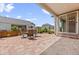 Back patio with outdoor seating offers plenty of space for entertaining with a view of other homes at 6420 Agave Ave, Castle Rock, CO 80108