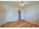 Bedroom with hardwood floors and two closets, and access to other rooms at 1060 S Coffman St, Longmont, CO 80501