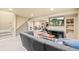Finished basement featuring a comfortable seating area and home exercise equipment at 9432 La Quinta Way, Lone Tree, CO 80124
