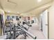 Spacious basement featuring a home gym area and comfortable seating at 9432 La Quinta Way, Lone Tree, CO 80124