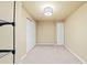 Finished basement bedroom with double closets and neutral walls at 9432 La Quinta Way, Lone Tree, CO 80124