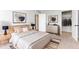 Comfortable bedroom with neutral tones, carpeted floor and ample closet space at 10722 E Exposition Ave # 314, Aurora, CO 80012