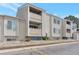 Apartment building exterior with well-maintained surroundings at 10722 E Exposition Ave # 314, Aurora, CO 80012