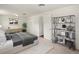Spacious bedroom with a closet, a dresser, a bed, a rug, and natural light at 945 Emerald St, Broomfield, CO 80020