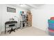 Finished basement storage room with shelving and desk at 11368 Lamar St, Westminster, CO 80020