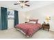 Spacious bedroom with carpeted floors and window coverings at 11368 Lamar St, Westminster, CO 80020