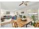 Bright dining area with a view into living room and kitchen at 11368 Lamar St, Westminster, CO 80020