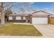 Brick ranch home with attached garage and landscaped lawn at 11368 Lamar St, Westminster, CO 80020