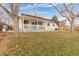 Ranch style home with covered porch and landscaping at 11368 Lamar St, Westminster, CO 80020