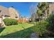 Expansive backyard featuring well-manicured lawn, established trees, and serene outdoor space at 13462 E Asbury Dr, Aurora, CO 80014