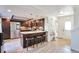 Beautiful kitchen with stainless steel appliances, granite countertops, and a stylish breakfast bar at 13462 E Asbury Dr, Aurora, CO 80014