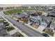 An aerial shot displays the layout of a neighborhood with green spaces, nearby homes and streetscape at 27837 E 8Th Ave, Aurora, CO 80018
