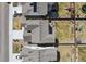 An aerial view depicts residences with neutral roofs and personal outdoor spaces, offering a bird's eye perspective at 27837 E 8Th Ave, Aurora, CO 80018