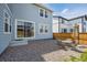 Backyard with sliding glass doors and patio seating area, offering easy indoor-outdoor living at 27837 E 8Th Ave, Aurora, CO 80018