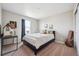 Bedroom with bed, decor, and a window that brings natural lighting into the home at 27837 E 8Th Ave, Aurora, CO 80018