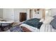 Bedroom with bed, decor, and a comfortable looking Papasan chair at 27837 E 8Th Ave, Aurora, CO 80018