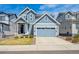 Charming two-story home with a two-car garage and low maintenance front yard at 27837 E 8Th Ave, Aurora, CO 80018