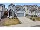 Charming home exterior with a well-maintained lawn, showcasing curb appeal and a welcoming facade at 27837 E 8Th Ave, Aurora, CO 80018