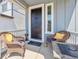 Charming front porch with comfortable seating, perfect for relaxing and enjoying the outdoors at 27837 E 8Th Ave, Aurora, CO 80018