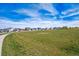 A vast green field offers plenty of open space in this welcoming neighborhood at 27837 E 8Th Ave, Aurora, CO 80018