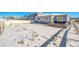 Snowy backyard with fenced perimeter and stone patio at 12785 Horton Ct, Parker, CO 80134