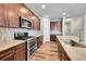 Modern kitchen with stainless steel appliances and granite countertops at 12785 Horton Ct, Parker, CO 80134