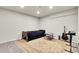 Neutral bedroom with a bed, rug, and desk for a quiet space to relax and work at 6484 N Ceylon Ct, Denver, CO 80249