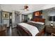 Tastefully decorated bedroom with unique wall features and complementary furnishings at 105 Dudley St, Lakewood, CO 80226