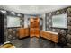 Spacious walk-in closet with custom built-ins for optimal organization and storage at 105 Dudley St, Lakewood, CO 80226