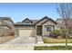 Charming single-Gathering home featuring a neutral color scheme, attached garage, and well-maintained landscaping at 12853 E 108Th Ave, Commerce City, CO 80022