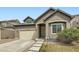 Charming single-Gathering home featuring a neutral color scheme, attached garage, and well-maintained landscaping at 12853 E 108Th Ave, Commerce City, CO 80022
