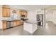 Modern kitchen featuring stainless steel appliances, granite countertops, and convenient island at 12853 E 108Th Ave, Commerce City, CO 80022