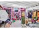 Basement area with pink shelves and organization solutions at 187 Cerillos St, Brighton, CO 80601