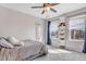Comfortable bedroom with windows and fan with natural light at 187 Cerillos St, Brighton, CO 80601
