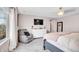 Calm bedroom with a comfortable chair and serene decor at 187 Cerillos St, Brighton, CO 80601