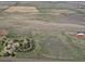 Overhead view of a countryside property with a comfortable house, several outbuildings, and vast open spaces at 7409 S County Road 157, Strasburg, CO 80136