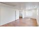 Bonus room with wood floors, multiple windows, and lots of natural light at 7409 S County Road 157, Strasburg, CO 80136