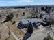 Areal view showcasing the home's location near open space, trails, and community amenities at 7160 S Jellison St, Littleton, CO 80128