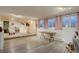 Spacious basement featuring finished floors and light from egress windows at 7160 S Jellison St, Littleton, CO 80128