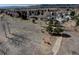 Aerial view of a neighborhood park with a playground, walking path, and open space at 7160 S Jellison St, Littleton, CO 80128