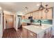 Modern kitchen with stainless steel appliances and island at 624 Pearl St # 301, Boulder, CO 80302